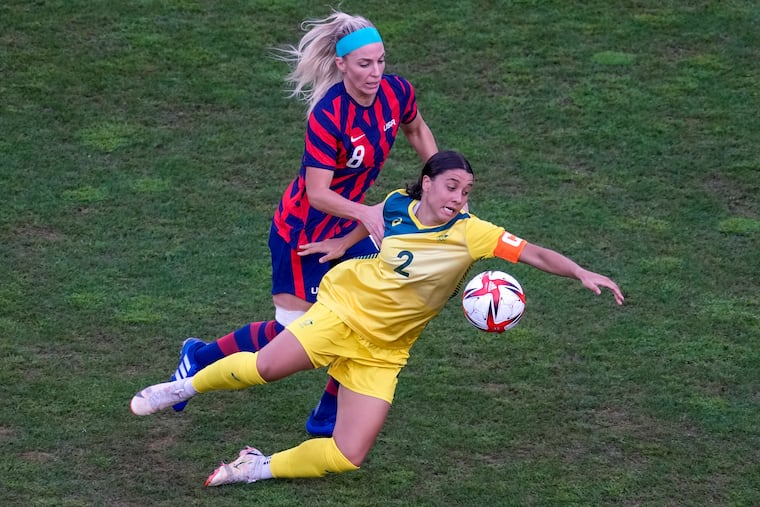 Julie Ertz (left) hasn't played in an official soccer game since the 2021 Olympics.