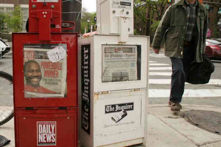 Honor boxes for the company's newspapers in University City. Philadelphia Newspapers L.L.C. also owns Philly.com.