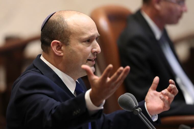 Israel's designated new prime minister, Naftali Bennett speaks during a Knesset session in Jerusalem Sunday, June 13.