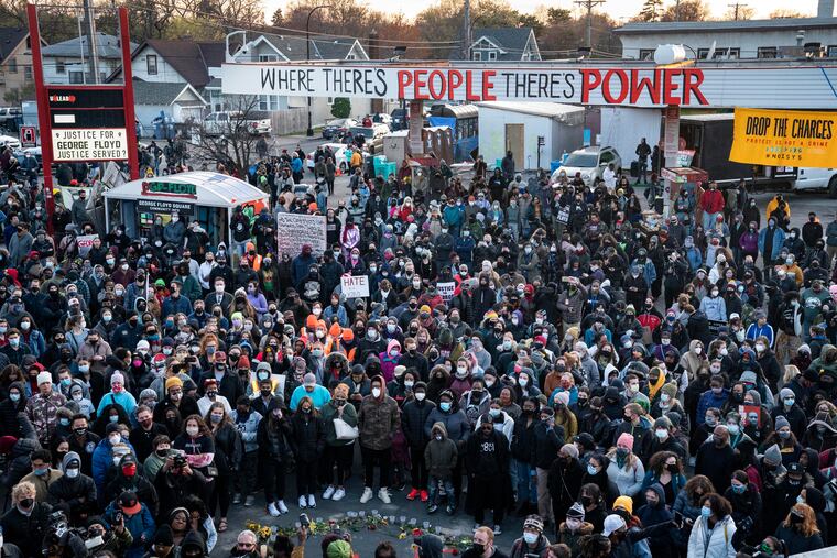 Demonstrators gather outside Cup Foods to celebrate the murder conviction of former Minneapolis police officer Derek Chauvin in the killing of George Floyd in 2021 in Minneapolis.