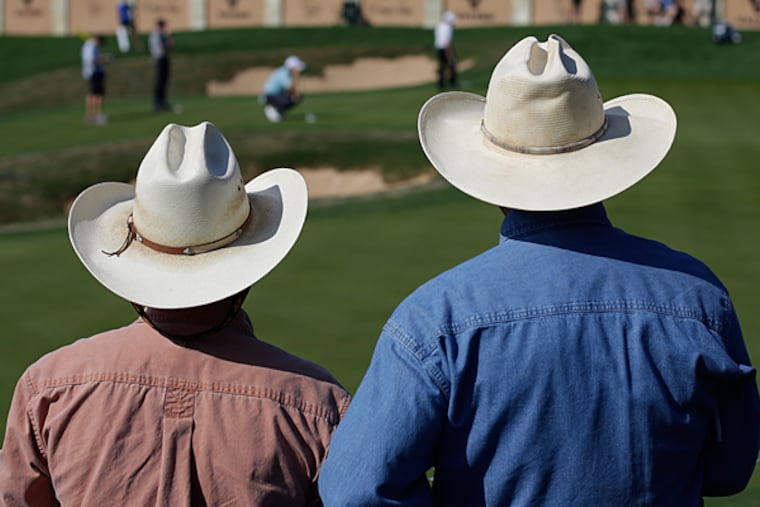 Golf fans watch the second round of the Valero Texas Open golf tournament, Friday, March 28, 2014, in San Antonio. (Eric Gay/AP)