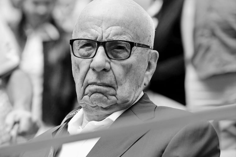 Rupert Murdoch waits for the start of the a tennis match at the U.S. Open last September.