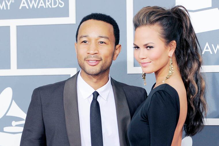 John Legend arrives at the 54th annual Grammy Awards on Sunday, Feb. 12, 2012 in Los Angeles. (AP Photo/Chris Pizzello)