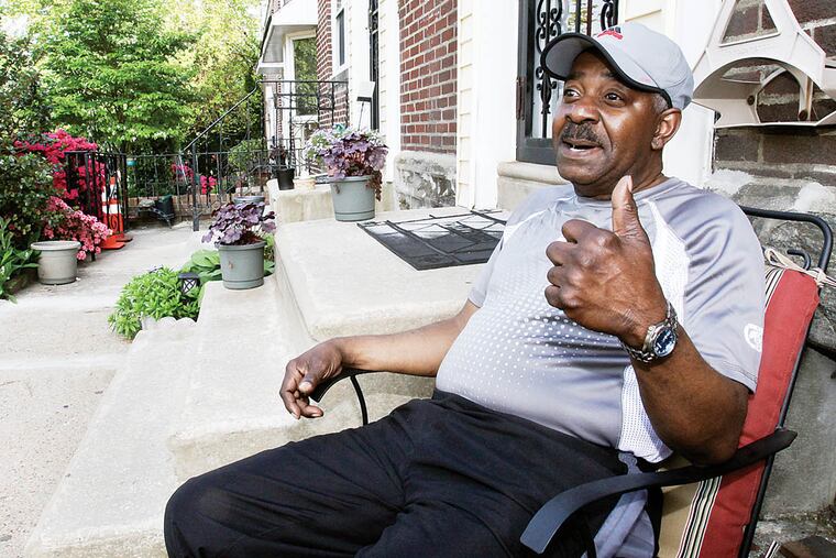 Michael J. Lyde Sr., a 43-year resident of Pickering Avenue in Cedarbrook, says he’s the unofficial “sheriff” of the neighborhood. ( Steven M. Falk / Staff Photographer )