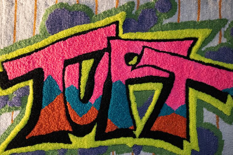 A colorful design printed on a rug is shown at the Tuft the World factory in Philadelphia, Pa.