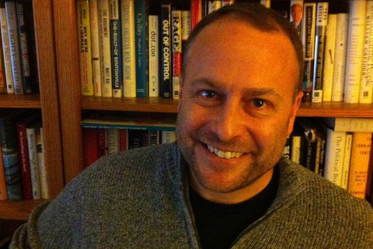 Bryon MacWilliams quit his newspaper job, moved to Russia, and came back with the first draft of his just-published book. (Kevin Riordan/Staff)