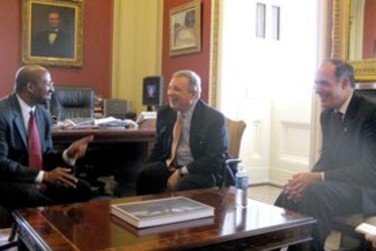 Philadelphia mayoral candidate Michael Nutter (left) meets with a pair of Democratic senators, Majority Whip Dick Durbin (center) of Illinois and Pennsylvania freshman Robert Casey Jr.