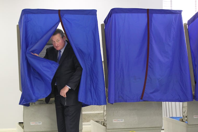 Jim Kenney, then a Democratic mayoral candidate, steps out of a voting booth after casting a ballot on Election Day on Nov. 3, 2015.