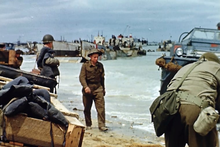 Landing craft on the beach during D-Day on June 6, 1944 in France. Seventy-five years later, surprising color images of the D-Day invasion and aftermath bring an immediacy to wartime memories. They were filmed by Hollywood director George Stevens and rediscovered years after his death. (War footage from the George Stevens Collection at the Library of Congress via AP)