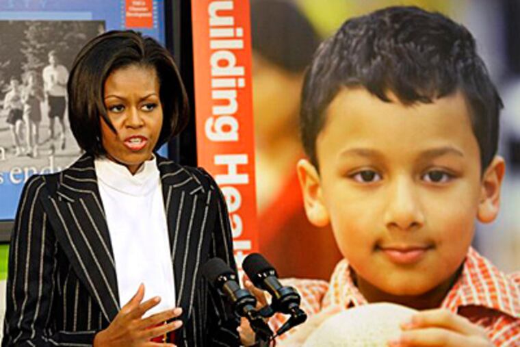First lady Michelle Obama speaks about childhood obesity, Thursday, Jan. 28, 2010, at the YMCA in Alexandria, Va. (AP Photo/Cliff Owen)