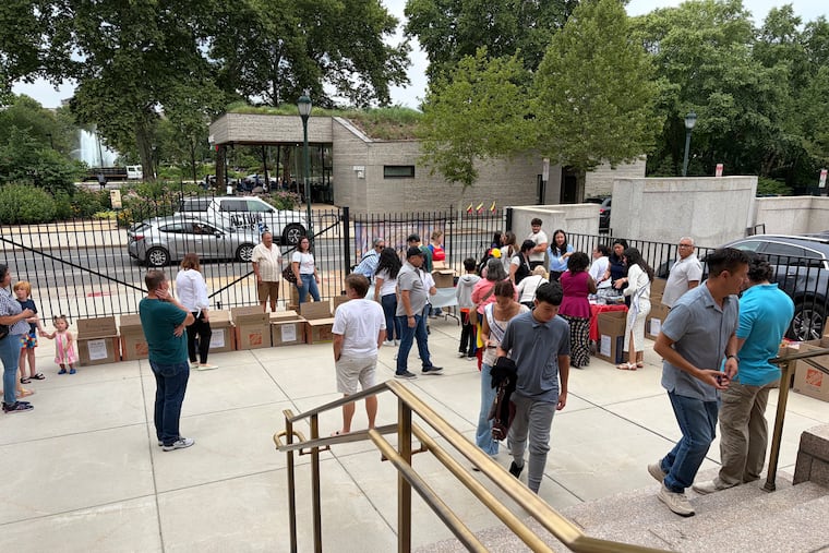 Dozens of Venezuelans gathered at the Cathedral Basilica of Saints Peter and Paul on Sunday to donate emergency supplies for victims of Wednesday's two earthquakes.