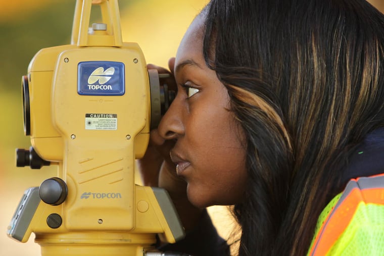 Angela Pannell surveys Fluehr Park in Philadelphia on October 27, 2014. Pannell is a recent graduate of the Street's Department Philly Future Track program. ( DAVID MAIALETTI / Staff Photographer )