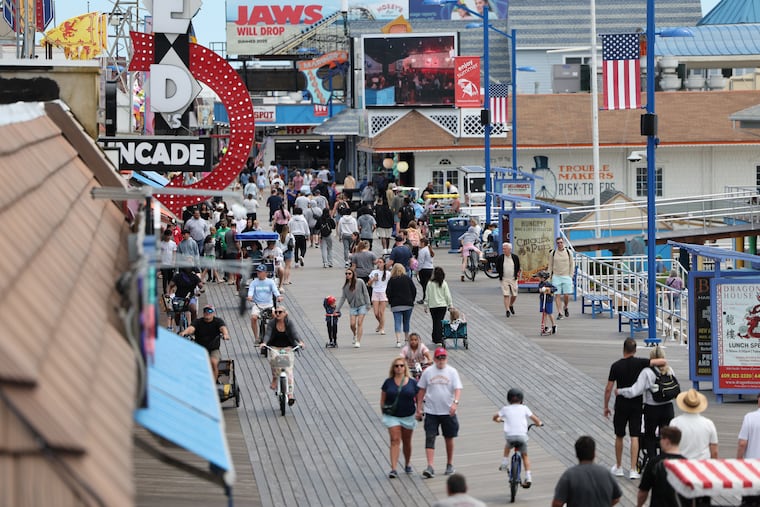 A crowd strolls along the boardwalk in Wildwood on May 26, 2025.