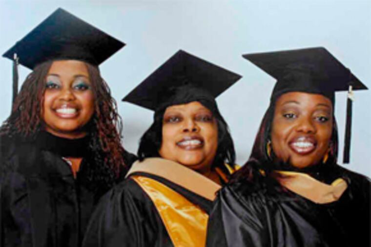Graduating (from left): Denise Garrison, 20; Gwendolyn McNuckles, 56; Dionne Garrison, 35.