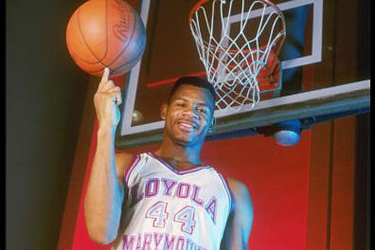 Forward Hank Gathers of the Loyola-Marymount Lions spins a basketball on his finger. (Tim de Frisco/Allsport)