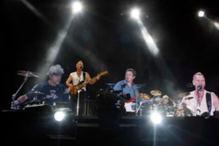 Sting (second from left) performs with video images of drummer Stewart Copeland, guitarist Andy Summers - and Sting himself. The front man, at 55, was impressively fit.