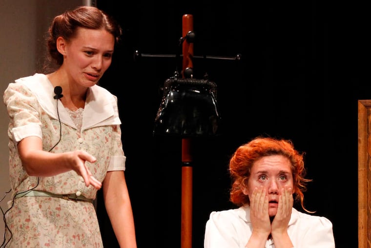 Allison Kessler (left) and Jenna Kuerzi rehearse a scene in one of three short plays premiering Friday in the East Gallery of Grounds for Sculpture, in Hamilton Township, Mercer County.