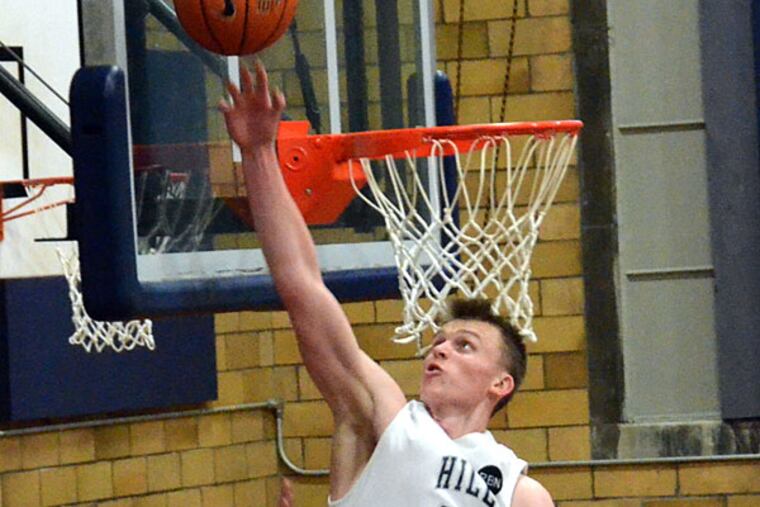 Hill School's John Carroll blocks a shot. (CHUCK GARRETSON)