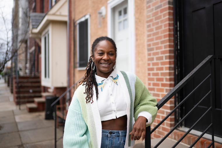 Jenica Jones stands outside her South Philly Airbnb earlier this week. She is among the homeowners still waiting for World Cup bookings.