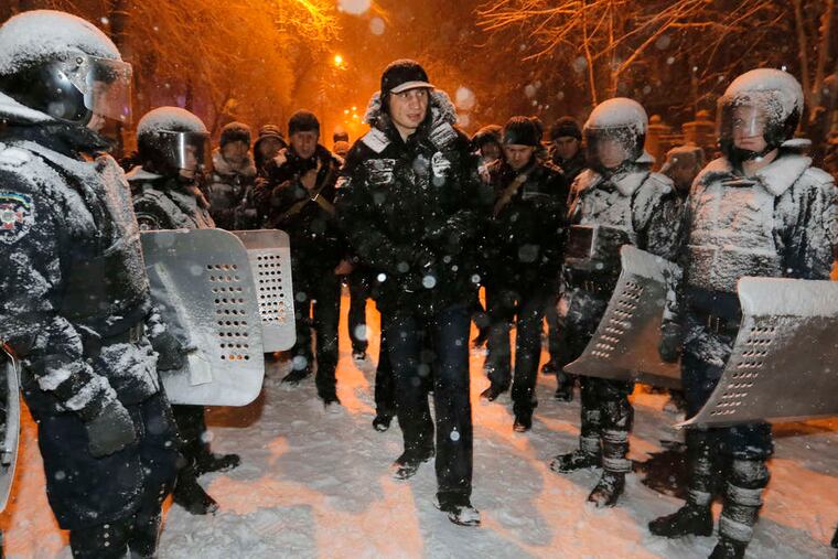Heavyweight boxing champion Vitali Klitschko, a Ukrainian lawmaker and opposition leader, attempts to head off clashes between police and pro-European Union activists in Kiev.