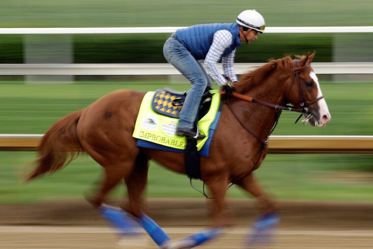 Improbable runs during a workout at Churchill Downs in May 2019.