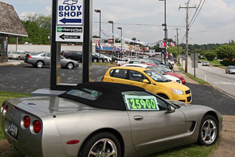Videon Chevrolet in Newtown Square got the bad news yesterday. Owner Frank Videon said: "My kids are grown, college is done. . . . I worry about my employees, though." (Michael Bryant / Staff Photographer)