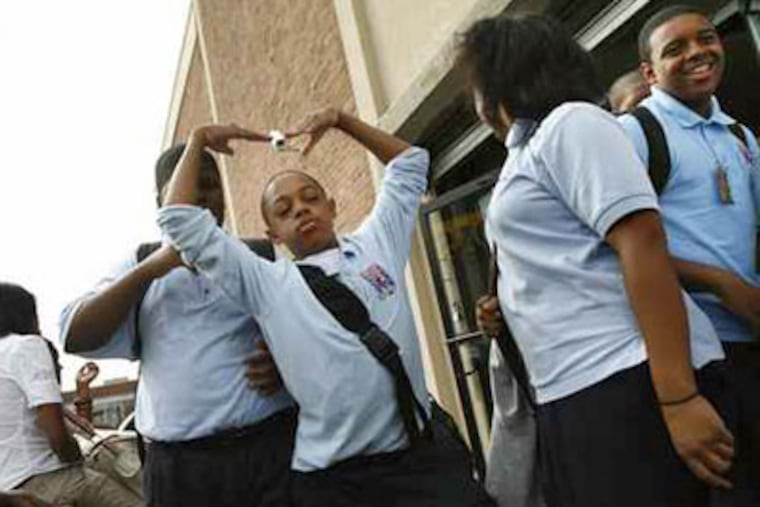 Students leave Germantown Settlement Charter School (5538 Wayne Ave) at the end of the school day. (Eric Mencher / Staff Photographer)