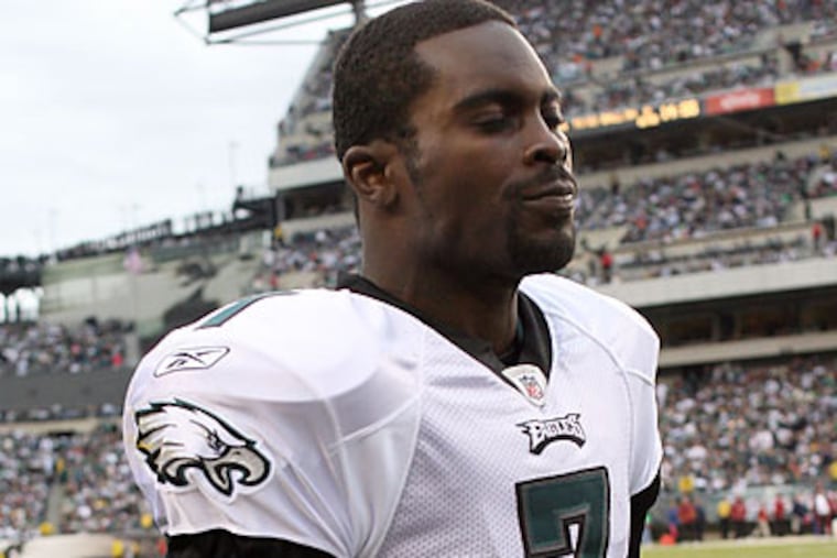Andy Reid said that Eagles quarterback Michael Vick has a crack in his rib cartilage. (Yong Kim/Staff Photographer)