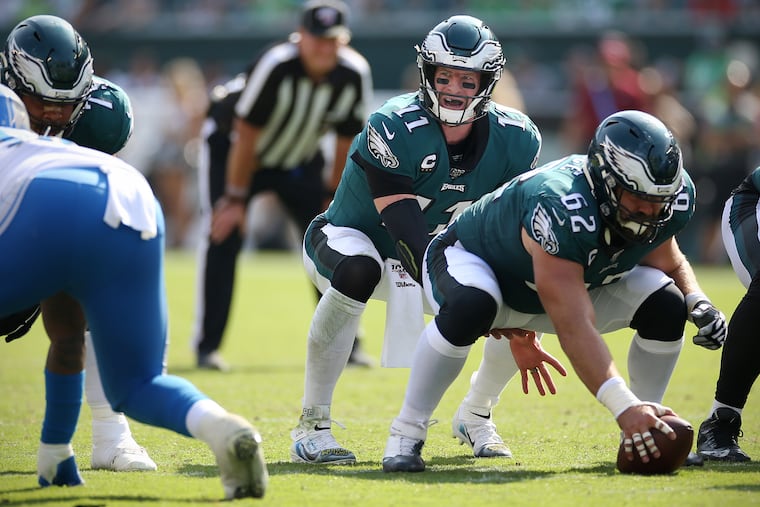 Carson Wentz taking a snap from under center against the Lions. The Eagles have been doing more of that this season.
