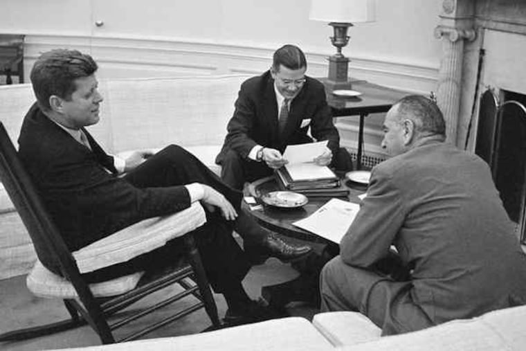 President John F. Kennedy and Vice President Lyndon B. Johnson confer with McNamara at the White House in 1961.