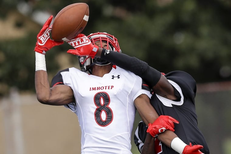 Yusuf Terry (left) and his Imhotep teammates are aiming for another Public League title.
