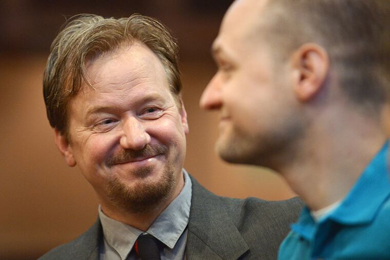 In this June 14, 2014 photo, Frank Schaefer, left, and his son Tim Schaefer speak before a ceremony where Frank Schaefer received an award for his public advocacy marking 10 years of legal gay marriage in Massachusetts. (AP Photo/Josh Reynolds)