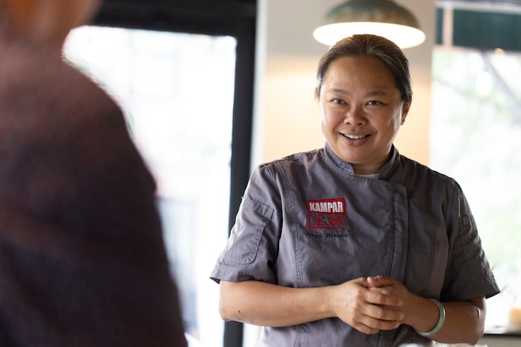 Ange Branca greets guests at Kampar, 611 South 7th Street. The Bella Vista restaurant has been closed since February due to a fire and is under renovation.