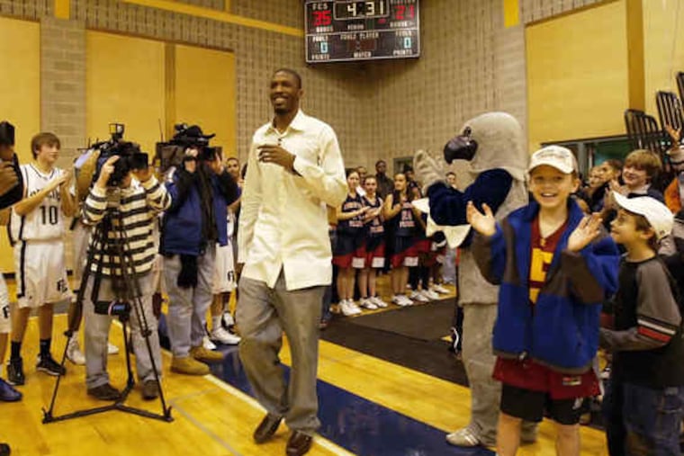 Friends' Central alum Hakim Warrick, now playing in the NBA, at the school in 2006 when his number was retired.