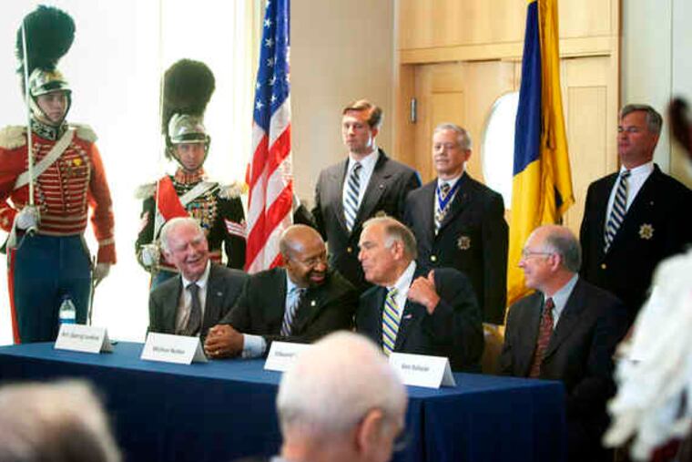 On hand to mark a land swap giving the American Revolution Center a home in Phila. were (seated from left) philanthropist H.F. "Gerry" Lenfest, Mayor Nutter, Gov. Rendell, and Interior Secretary Ken Salazar. The center had been mired in legal battles over a Valley Forge site.