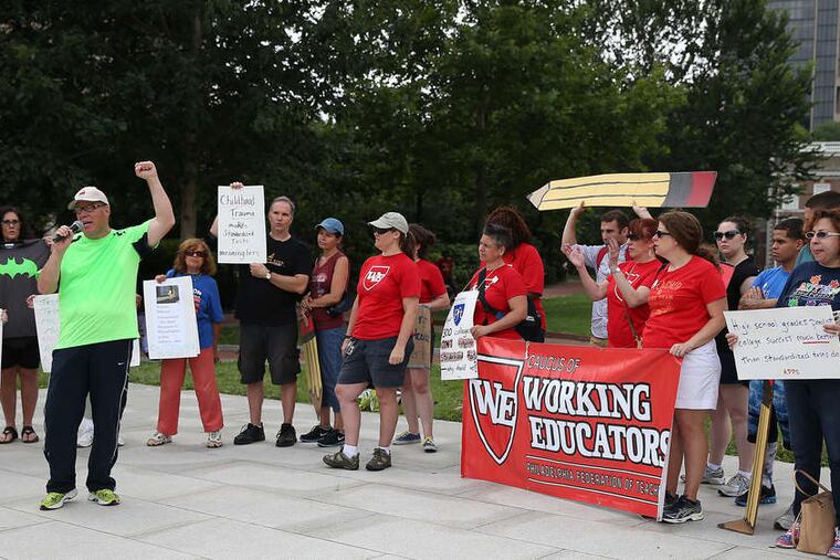 Jesse Turner , an education professor at Central Connecticut State University who is walking to Washington to deliver his message, talks about resisting standardized tests. DAVID MAIALETTI / Staff Photographer