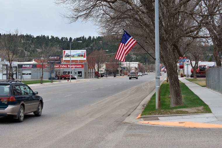 Traffic along Main Street in Roundup, Mont., as seen on Monday. A few businesses reopened in the small town this week as Montana began to lift restrictions imposed over the coronavirus.