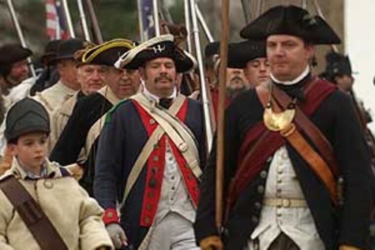 Last year's Gen. George Washington, played by Robert Gerenser, on the march into Washington Crossing Park