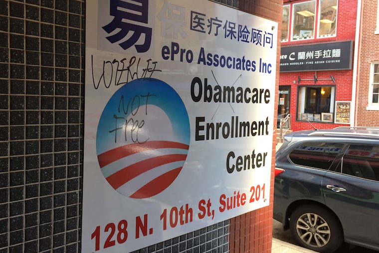 A sign at an insurance brokerage in Philadelphia's Chinatown section advertises Obamacare sign-ups. Affordable Care Act plans in Southeastern Pennsylvania and New Jersey have unusually broad physician networks, according to an analysis from the University of Pennsylvania's Leonard Davis Institute of Health Economics.