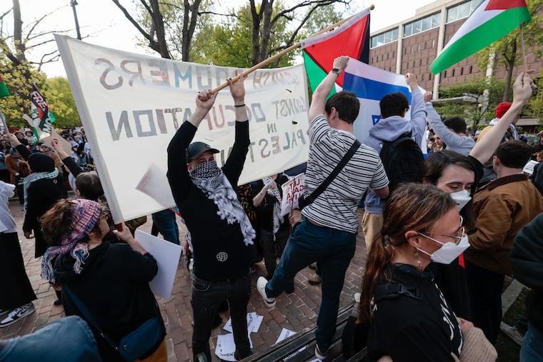 People protest on the University of Pennsylvania campus in Philadelphia on Thursday, April 25, 2024