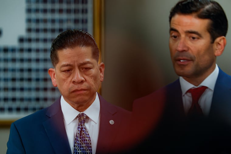 Former Uvalde school district police officer Adrian Gonzales (left) with his attorney, Nico LaHood, after the jury found Gonzales not guilty at the Nueces County Courthouse in Corpus Christi, Texas.
