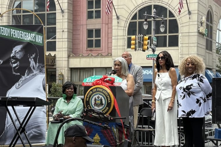 (L to R) Mayor Cherelle L. Parker, Black Music Month founder Dyana Williams, Councilmember Mark Squilla, Teddy Pendergrass' widow, Joan Pendergrass, and host Patty Jackson at the unveiling of Teddy Pendergrass Way on the 400 block of South Broad Street on Saturday.