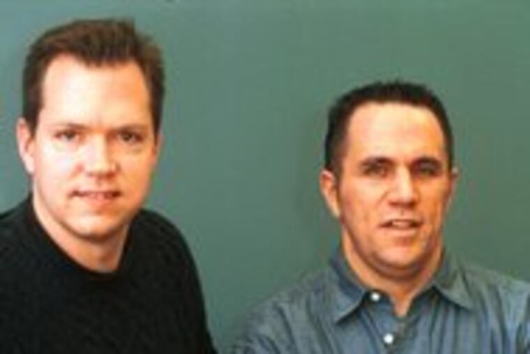 Matt Gillin (left) and Paul Raden in a 2002 photograph. They started Ecount, an electronic-payments firm,in 1995 in Gillin's parents' basement in Bryn Mawr.