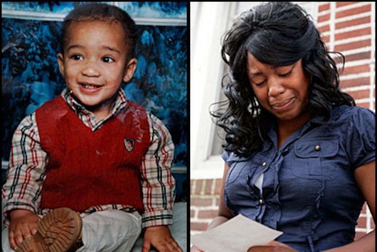 Brandon Thompson,4, left, was shot and killed in Camden Monday night. His mother, Stephanie, right, weeps. (Laurence Kesterson / Inquirer)