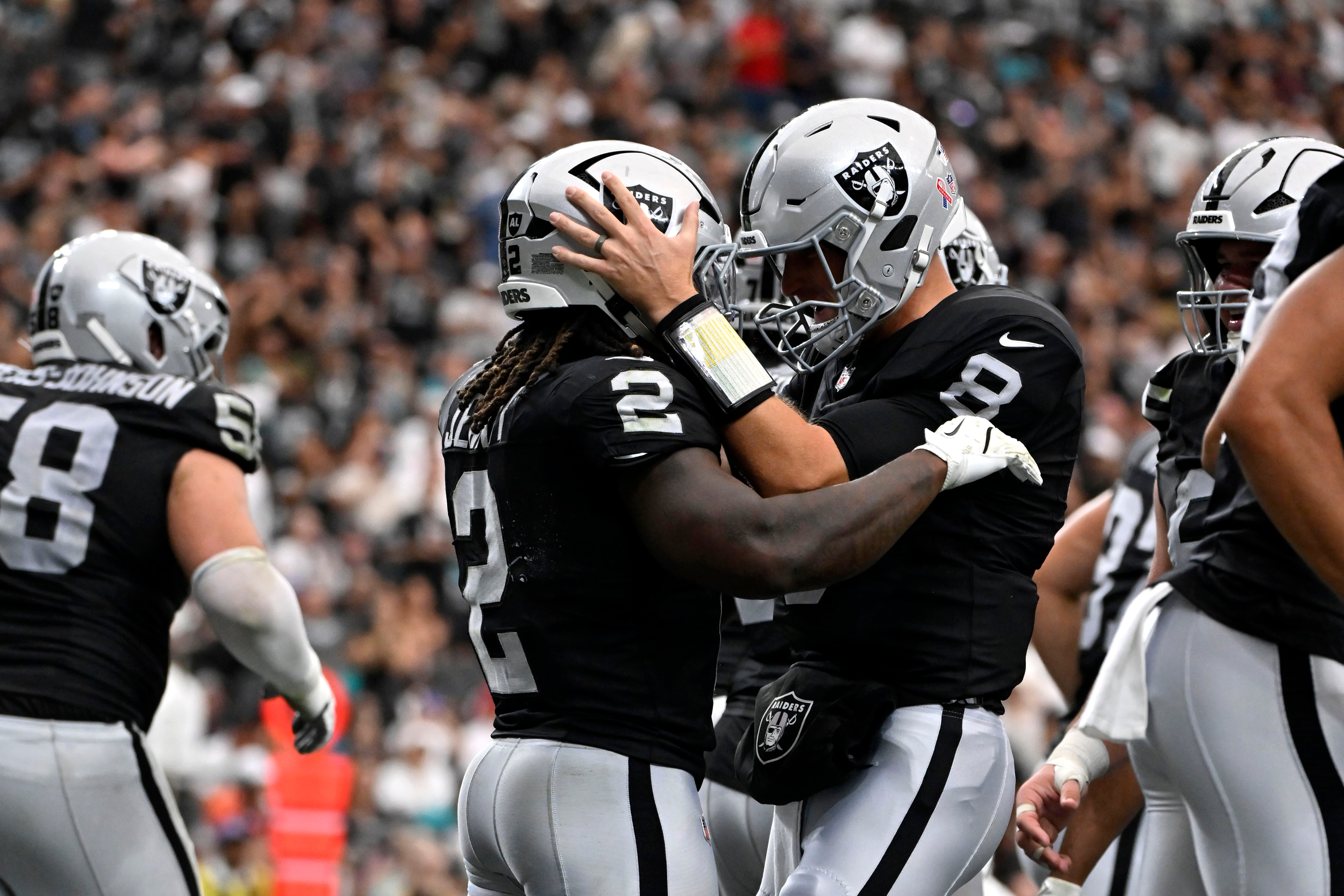 Kirk Cousins hits 301 career TD passes as Raiders open the season with a 27-13 win over Dolphins