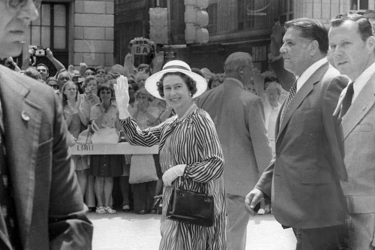 Queen Elizabeth II waves to the crowd in front of City Hall during her 1976 visit to Philadelphia.