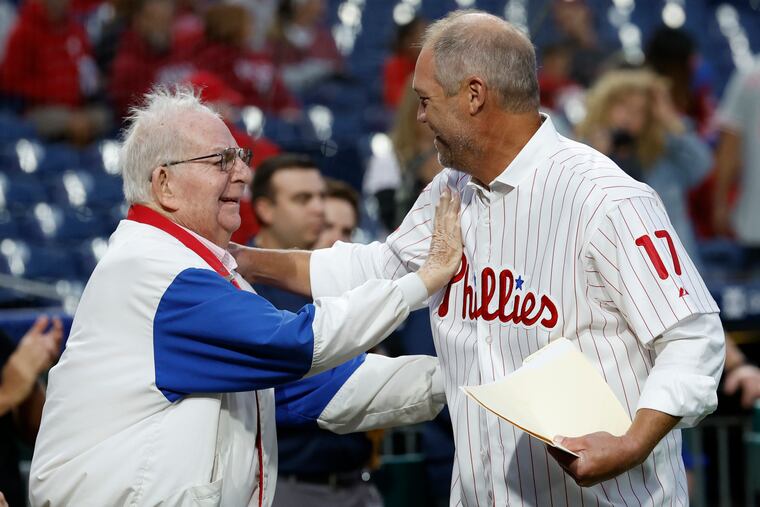 Former Phillies third baseman Scott Rolen (right) shares a moment with former Phillies executive Bill Giles during Rolen's Phillies Wall of Fame induction ceremony.