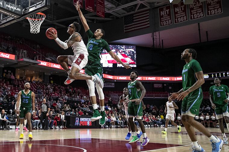 Temple guard Nate Pierre-Louis makes the basket in the second half of a loss to Tulane.