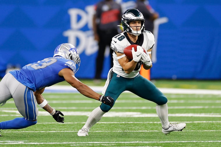 Eagles punt returner Britain Covey catches the football as the Lions' Mike Hughes defends on Sept. 11 in Detroit.
