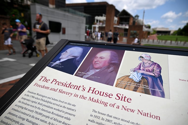 A display describing the lives of enslaved people on the site where one of George Washington's homes once stood in Independence National Historical Park.
